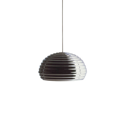 Flos Splügen Bräu by Achille Castiglioni. A sleek black pendant lamp with ribbed horizontal lines hangs against white.