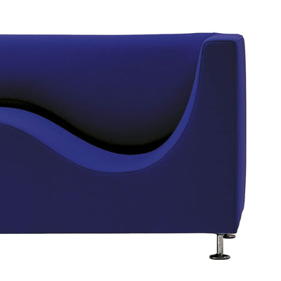 Cappellini Three Sofa de Luxe by Jasper Morrison. A sleek navy blue sofa with curved lines and metallic legs.