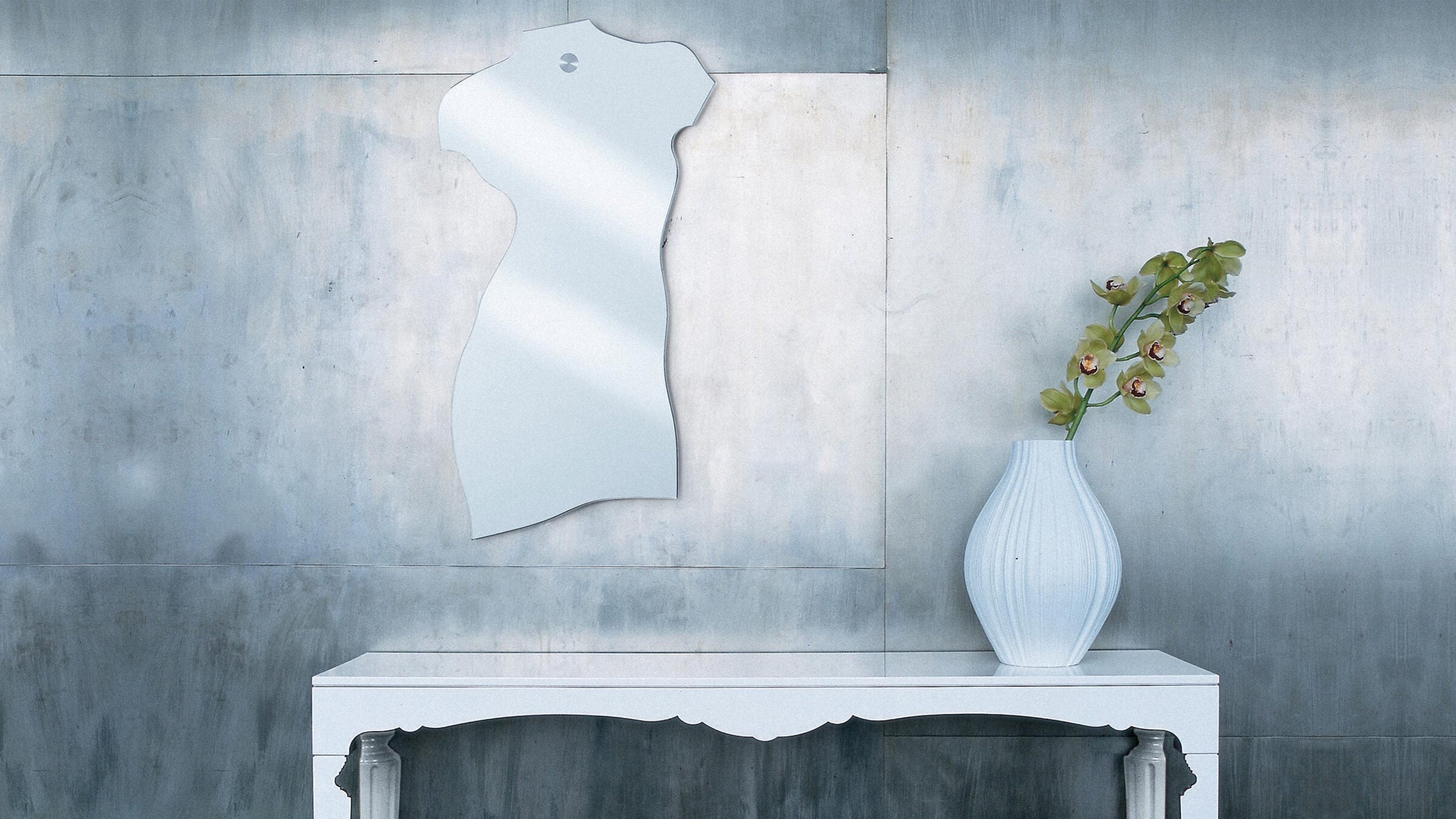 Desktop / BlackMenu / Milo Silhouette Mirror, designed by Carlo Mollino