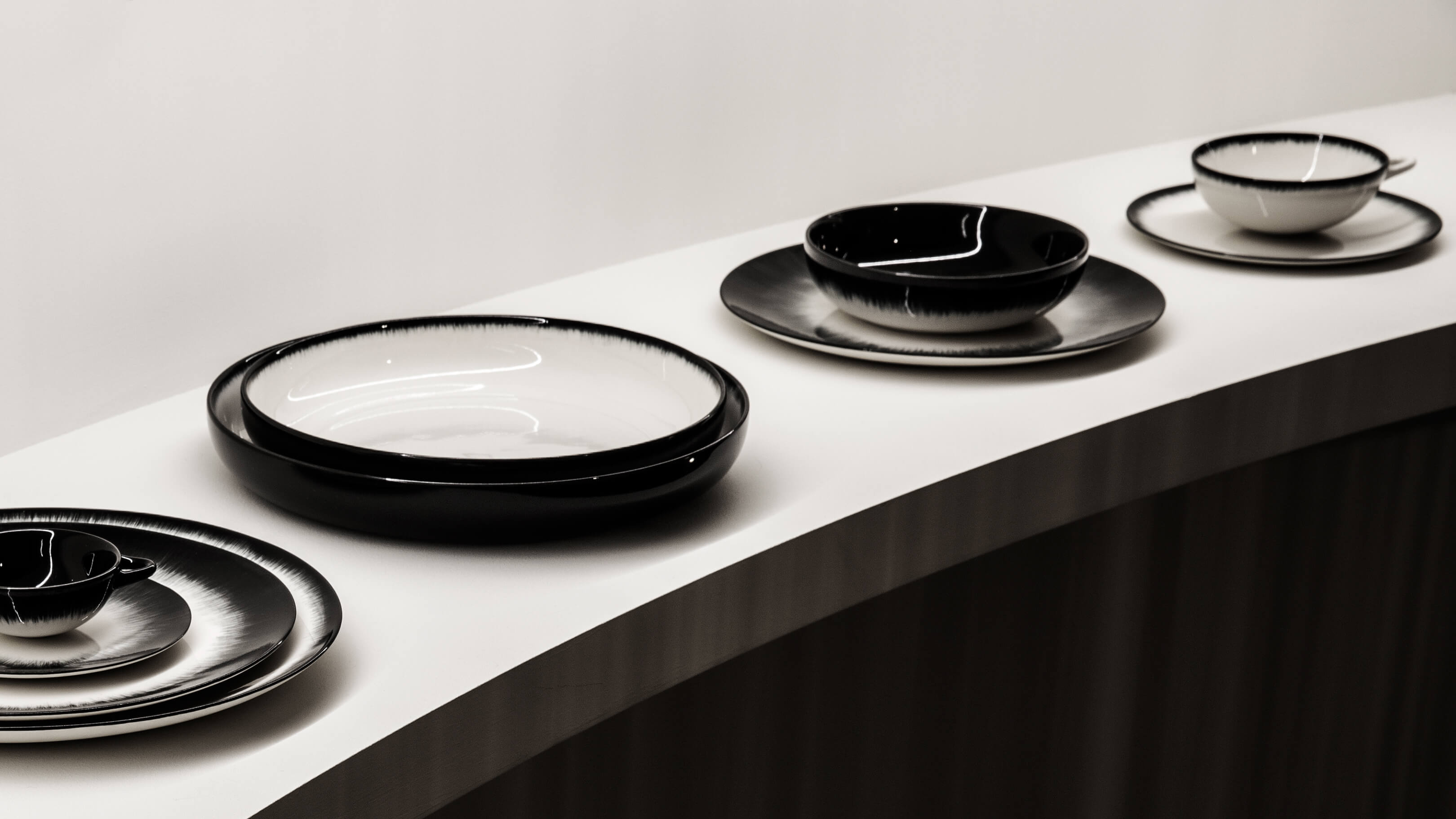 Dé High Plate 2 / 5in / Desktop / BlackMenu / Dé Off-White and Black High Plate, designed by Ann Demeulemeester