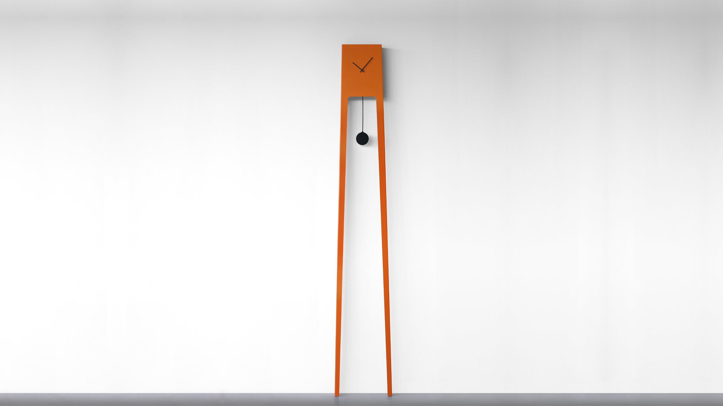 Orange / Desktop / BlackMenu / Tiuku Standing Pendulum Clock, designed by Ari Kanerva